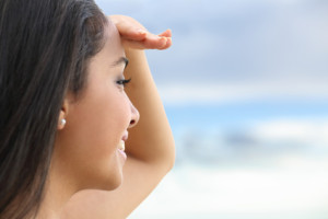 Close up of a beautiful woman looking at the horizon